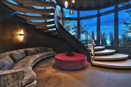 big-Curved staircase with stainless steel railing